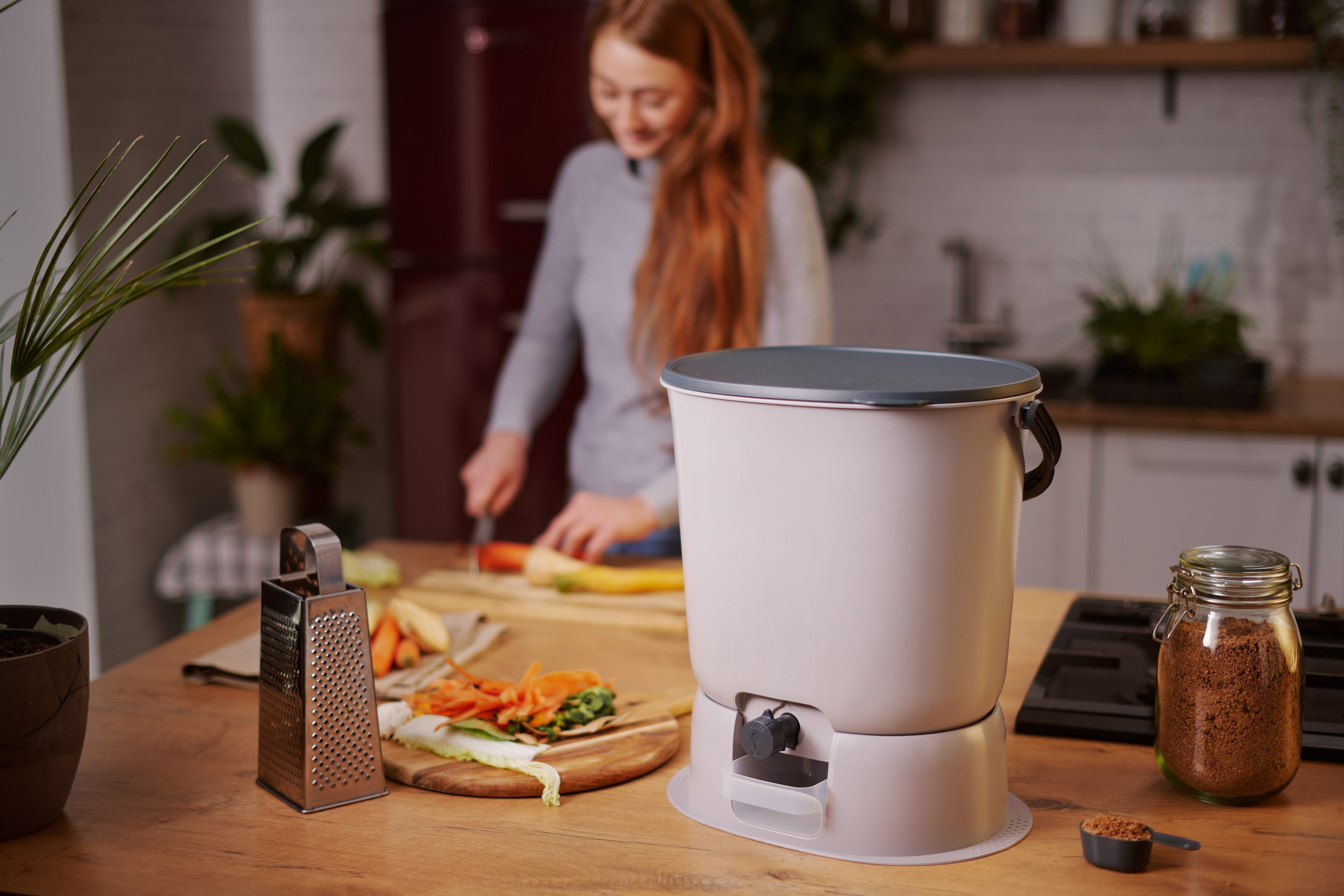 Bokashi Organko Essential + base on the kitchen counter while preparing food