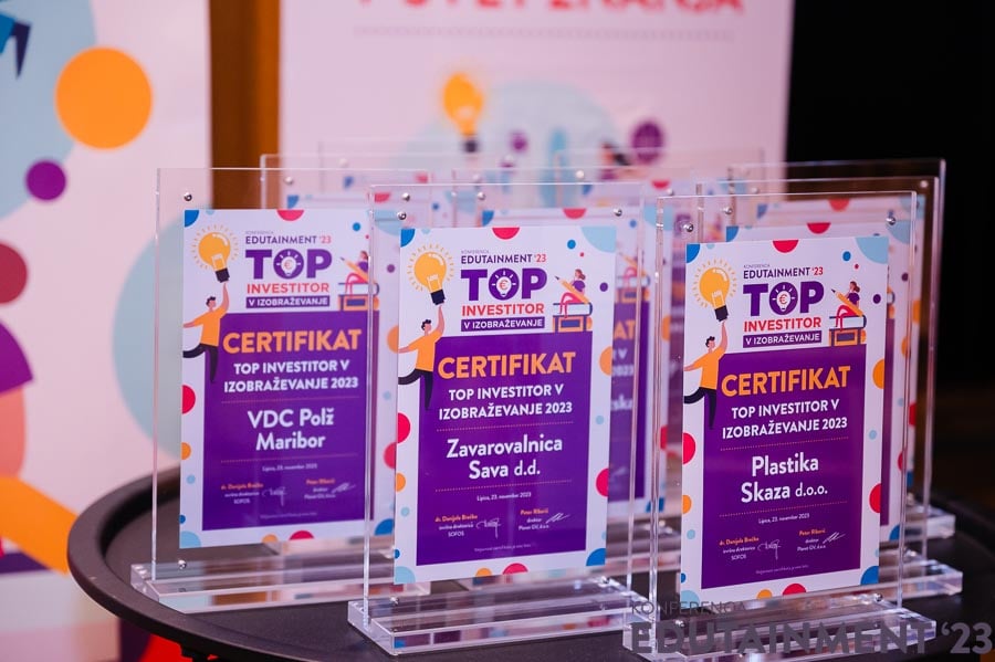Skaza receives the certificate Top investor in education